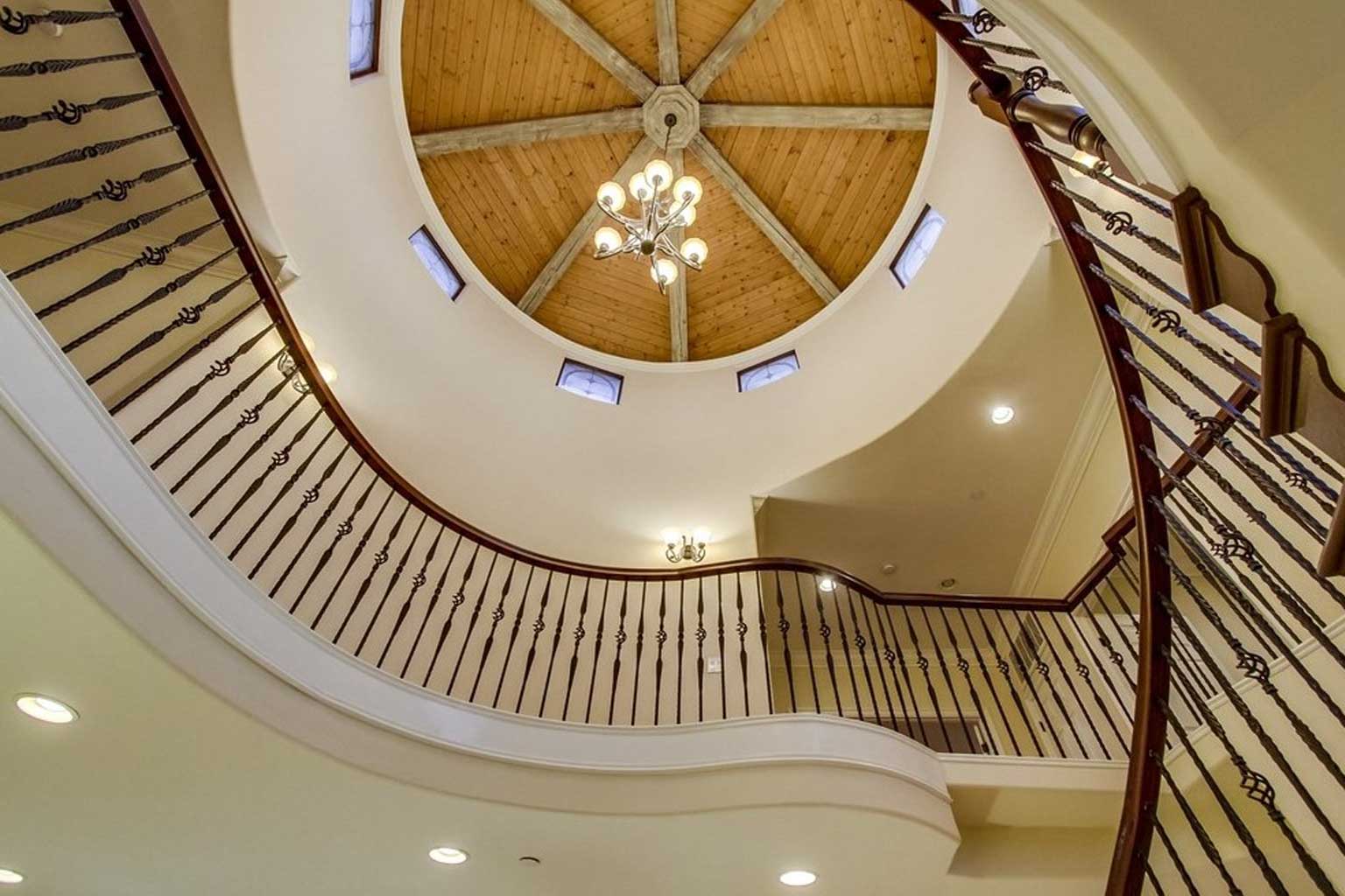 Custom Home Architectural Staircase and Beams