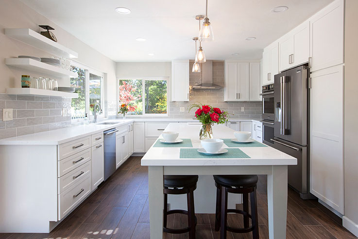 Beautiful kitchen and living room design: removed wall separating the kitchen from the living room.  Very open and bright.