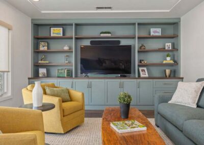 Custom home addition built in shelving and entertainment center